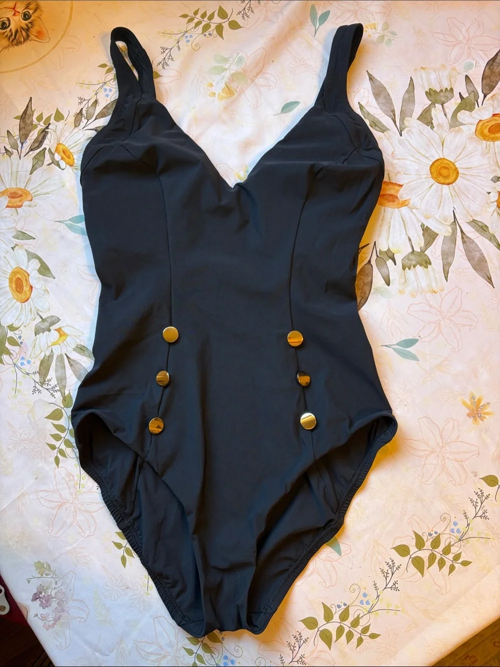 Sleek Black One-Piece Swimsuit with Gold Button Accents